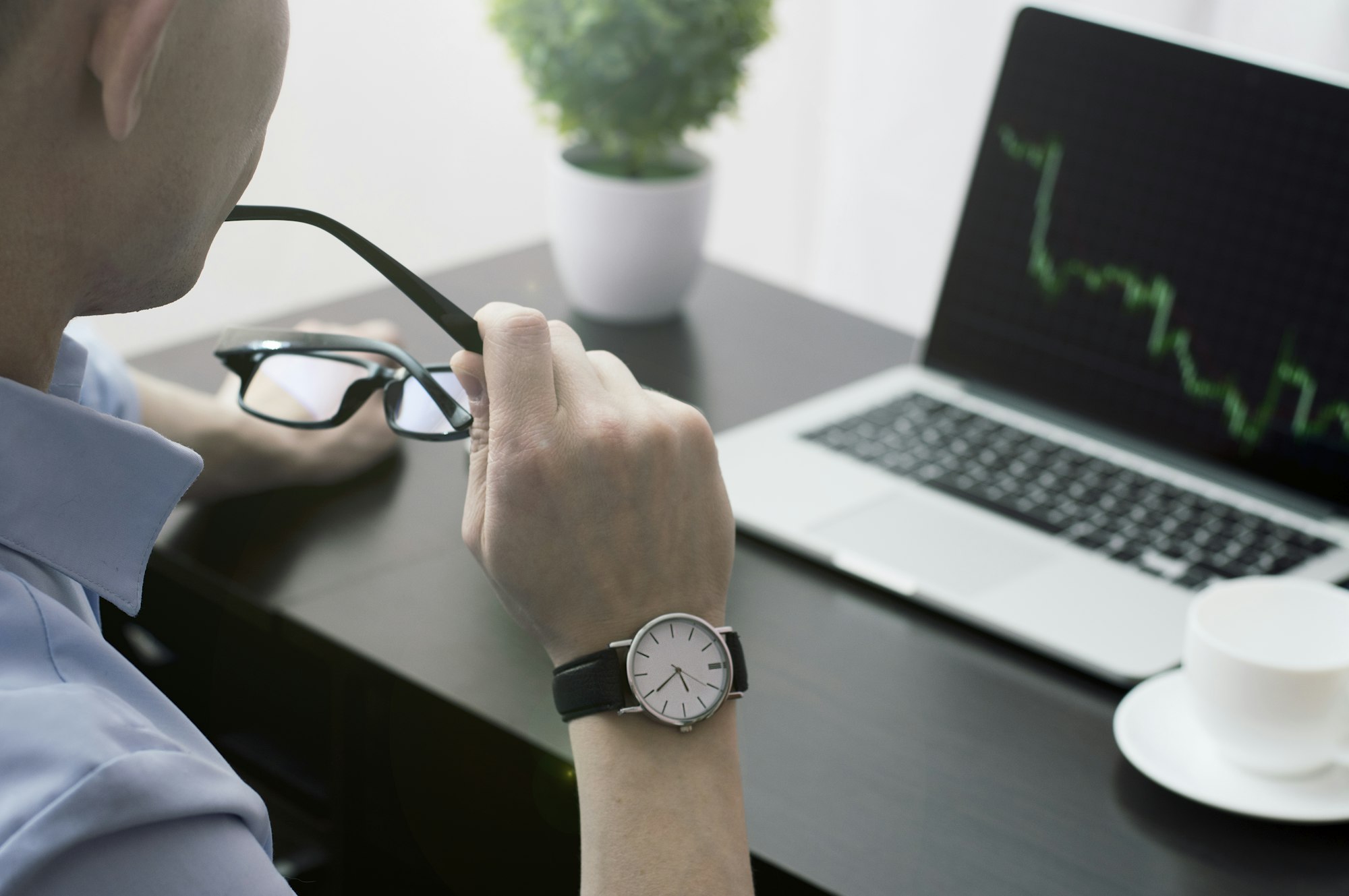 Trader working at the office.